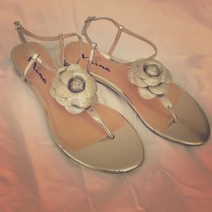 Gold rose sandals by Nina